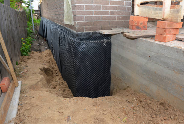 SJ Waterproofing Pros technician performing targeted Foundation Crack Repair assessment in Dalton, GA